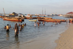 Lokal kids taking a dip at the city beach