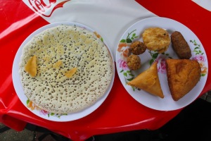 Lunch at the hospital. (Pancake, samosa and other local dishes)