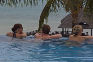 Jurgita, Kari and Ulrika relaxing in the pool after a long ride on the horse.