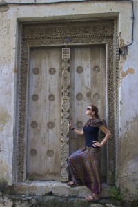 Jurgita with one of the old doors in the city center. There are 200 different types of these doors.